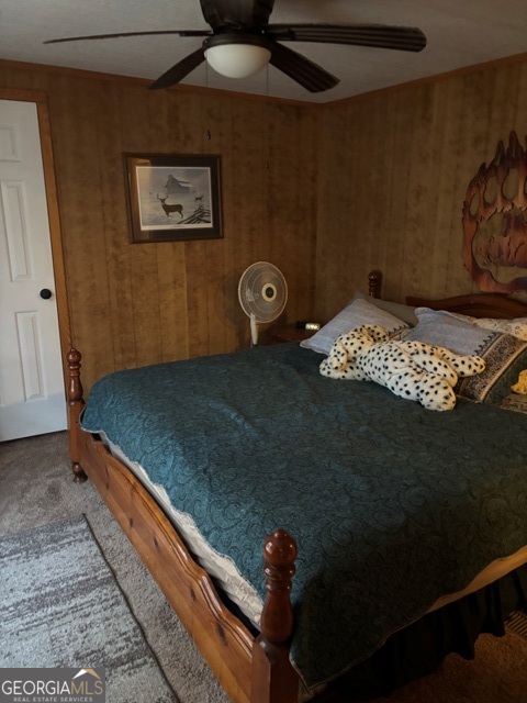 592 Clifford Meeks Road Collins, GA 30421 - Photo 9 of 52 a bedroom with a bed and a window