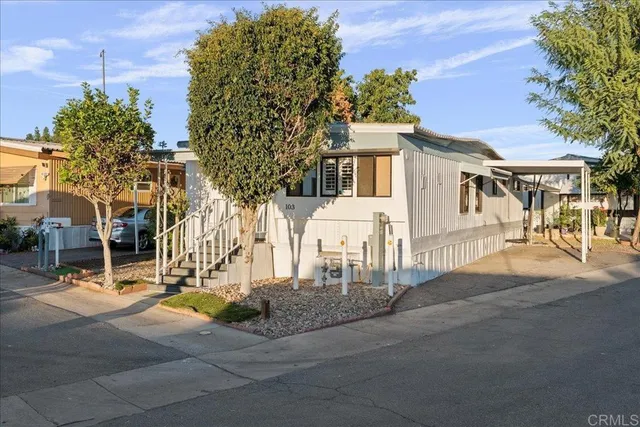 a view of a building with a street