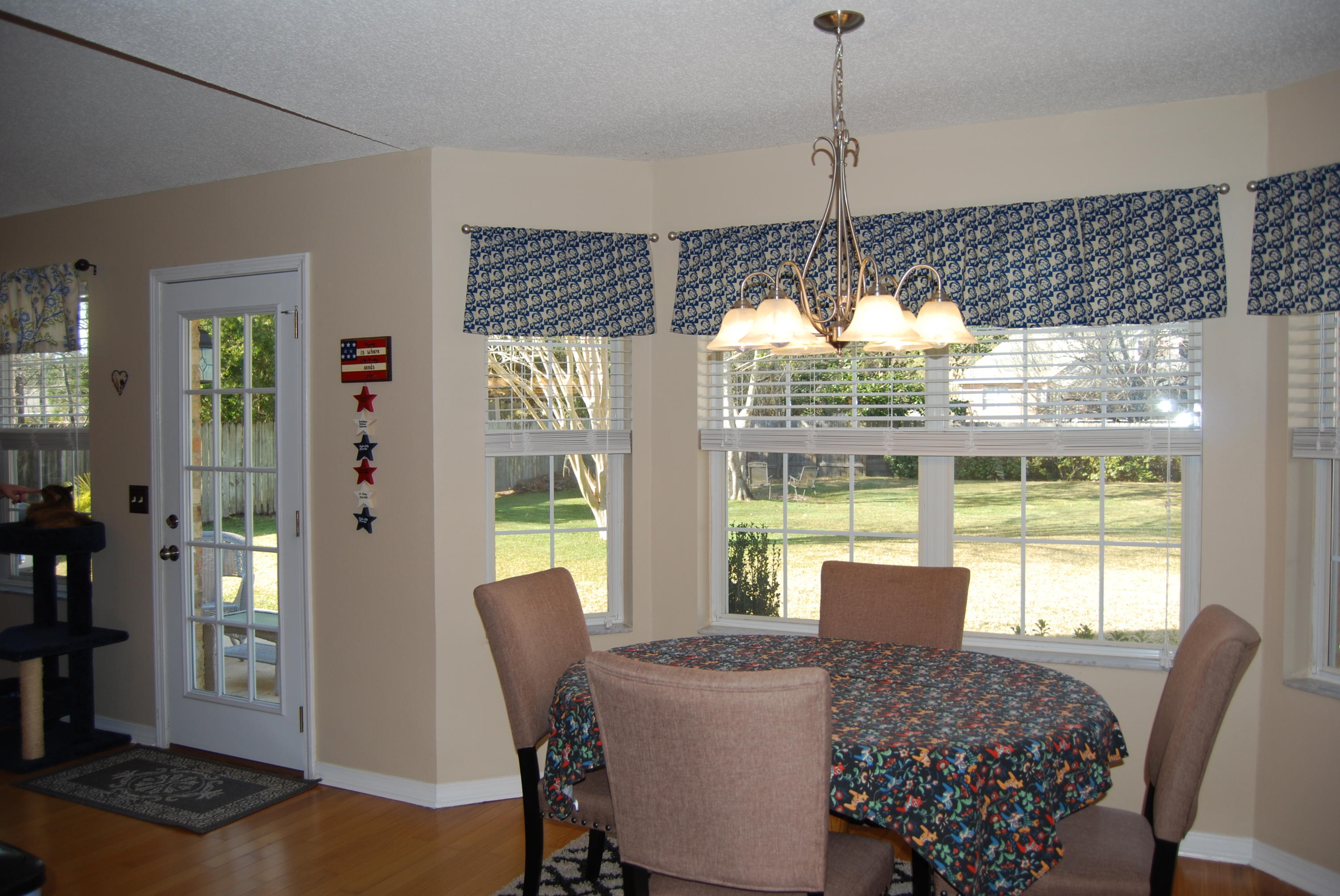 4455 Kingslynn Road Niceville, FL 32578 - Photo 13 of 36 a view of a dining room with furniture window and outside view