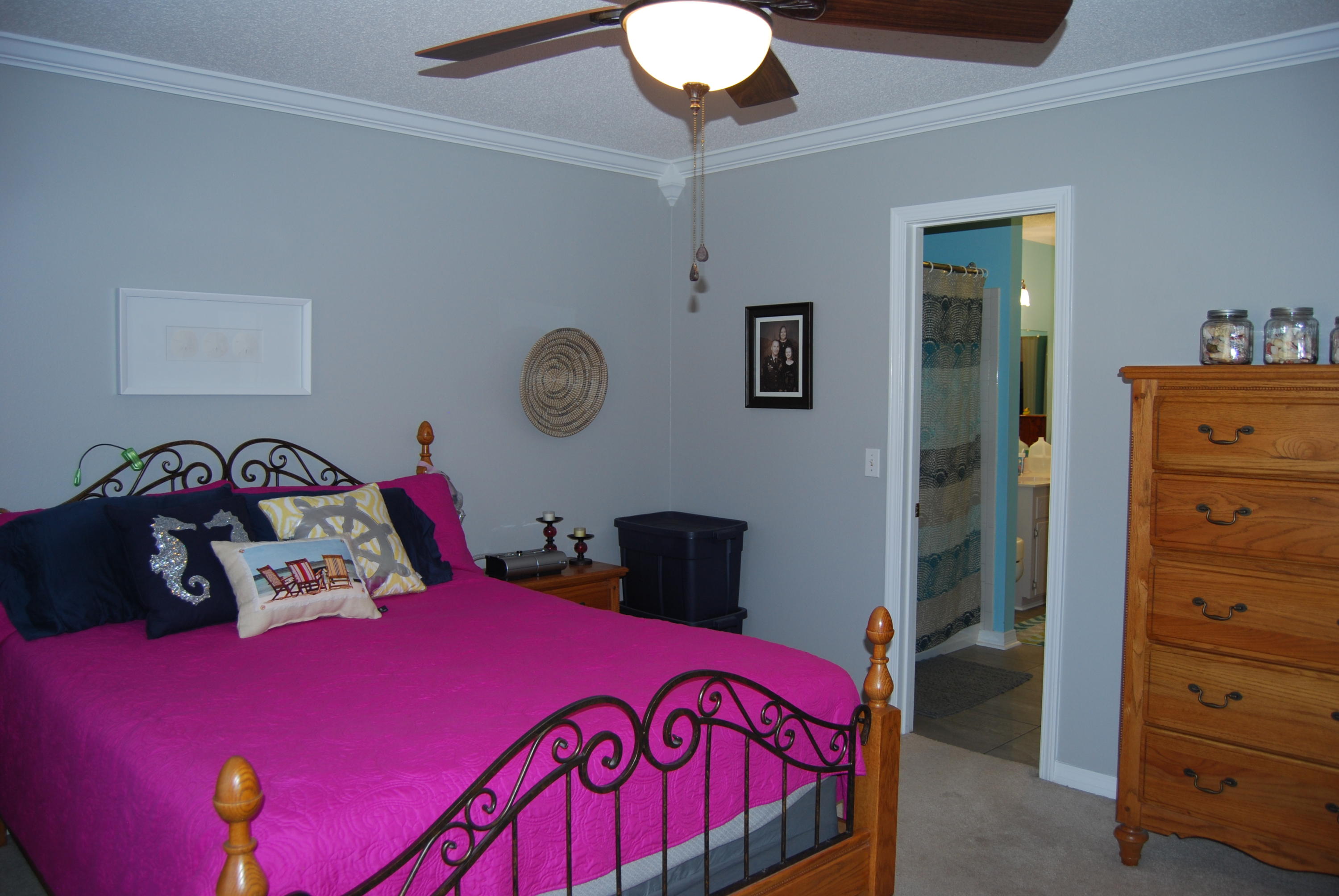 4455 Kingslynn Road Niceville, FL 32578 - Photo 16 of 36 a bedroom with a bed and a closet