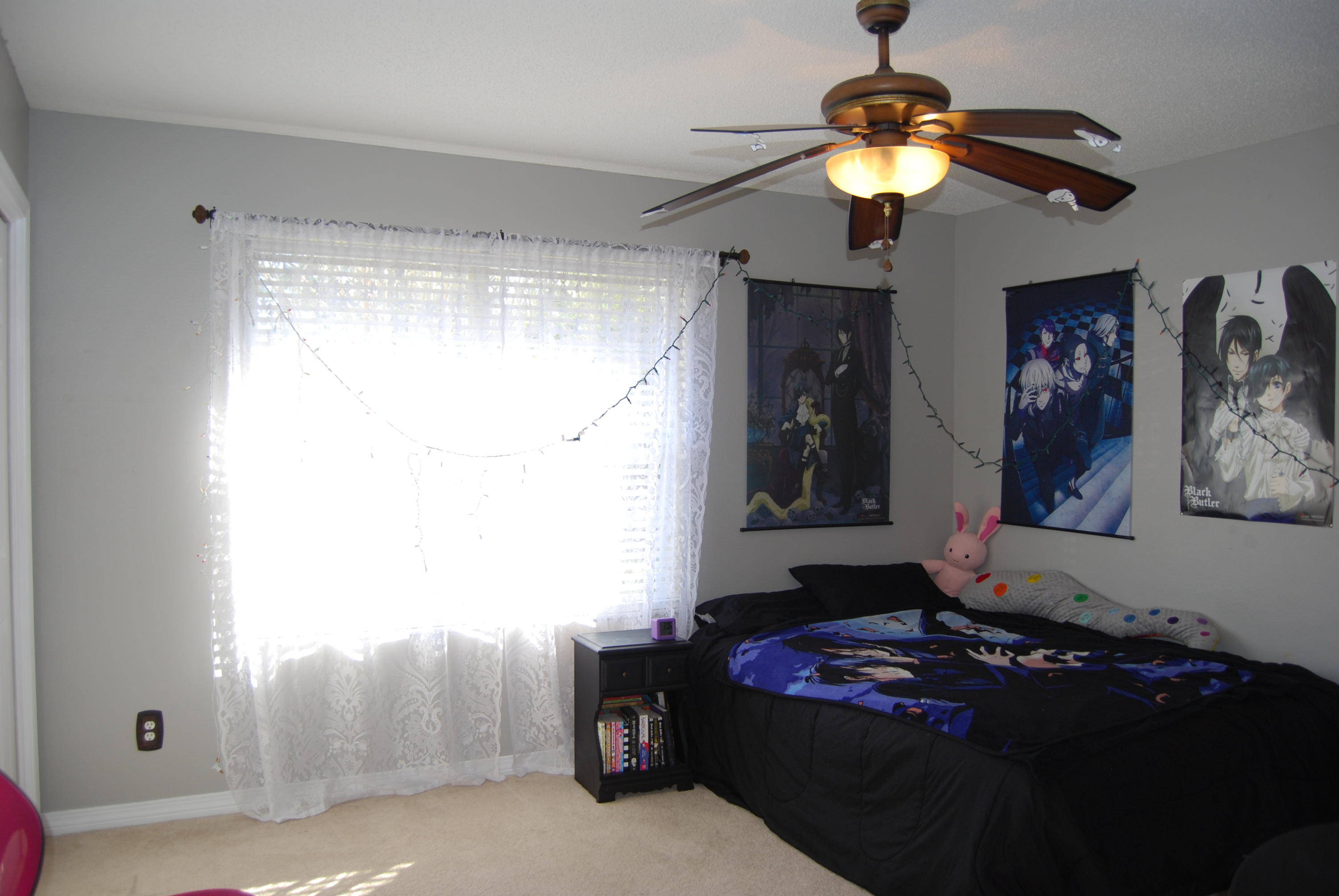 4455 Kingslynn Road Niceville, FL 32578 - Photo 22 of 36 a bedroom with a bed and a chandelier