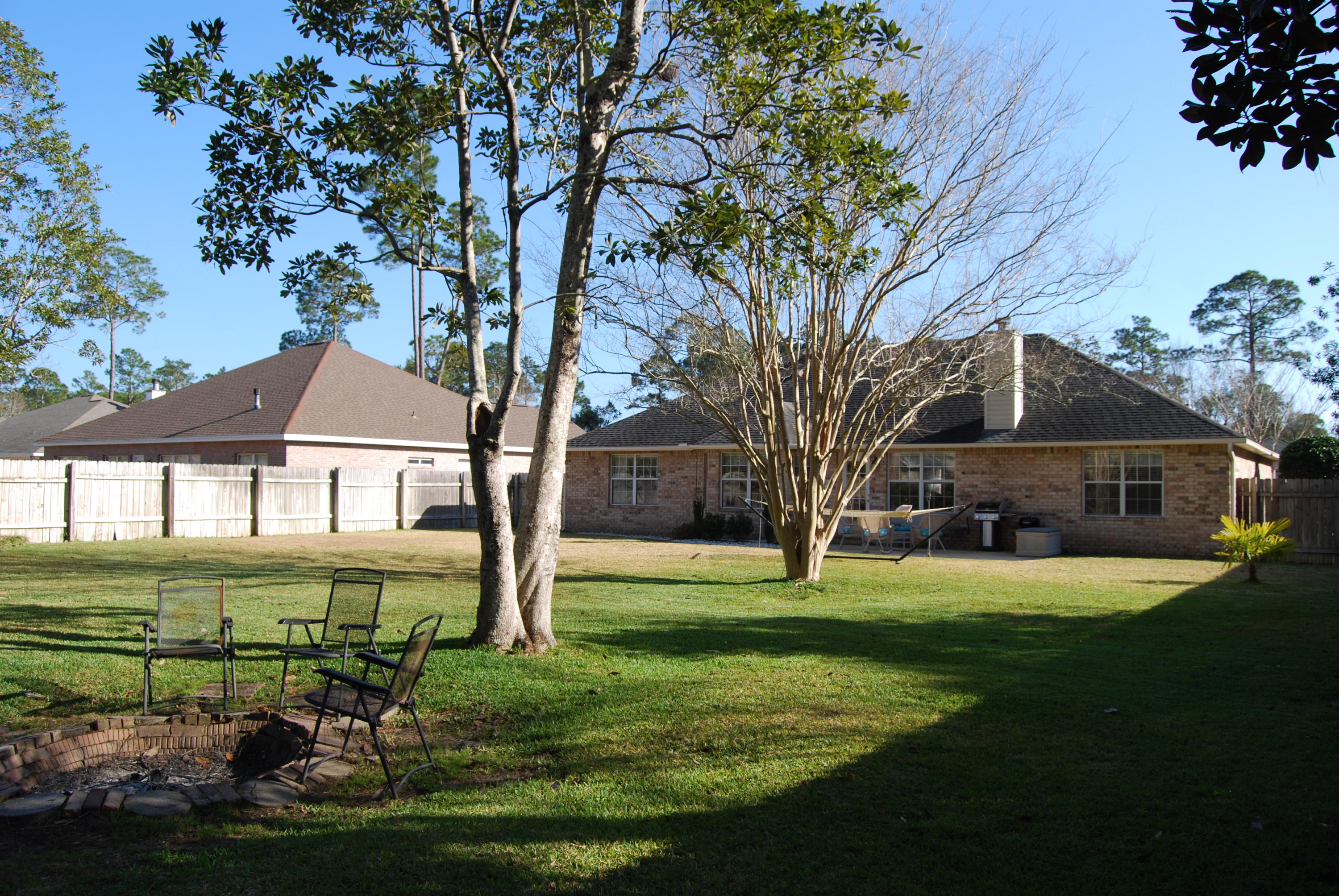 4455 Kingslynn Road Niceville, FL 32578 - Photo 33 of 36 a front view of a house with a yard