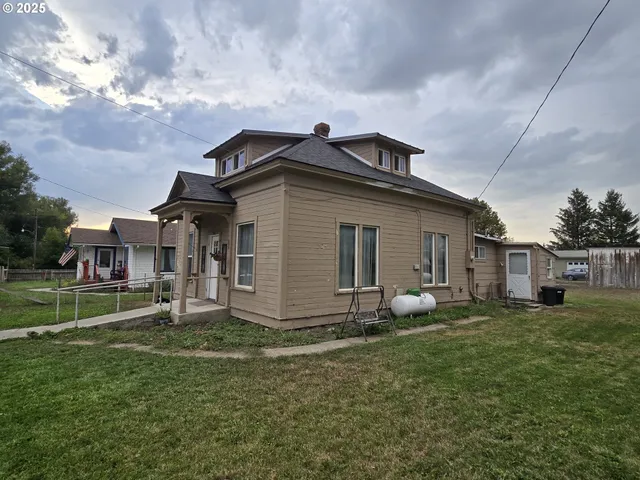 a house view with a garden space