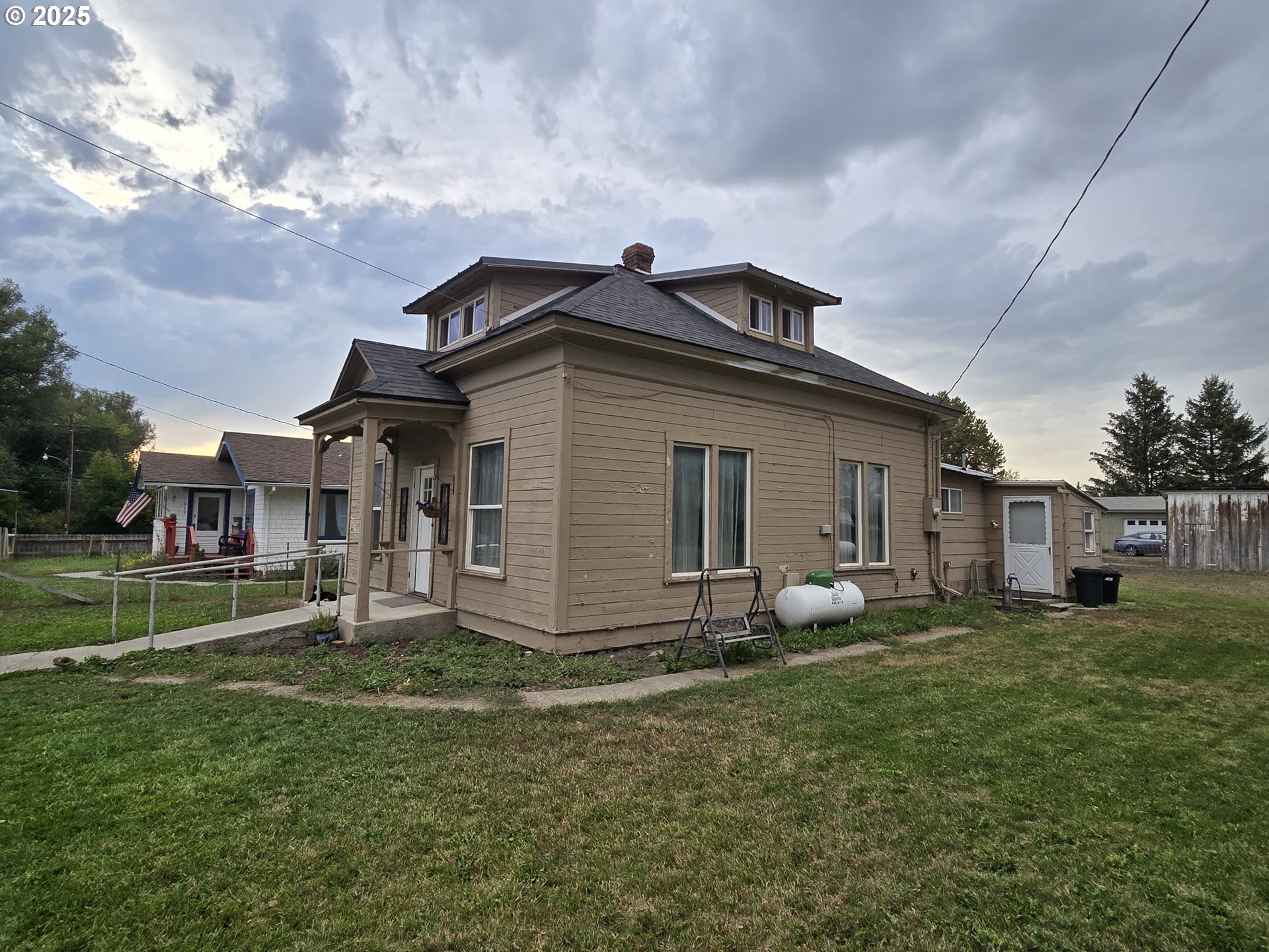 a house view with a garden space