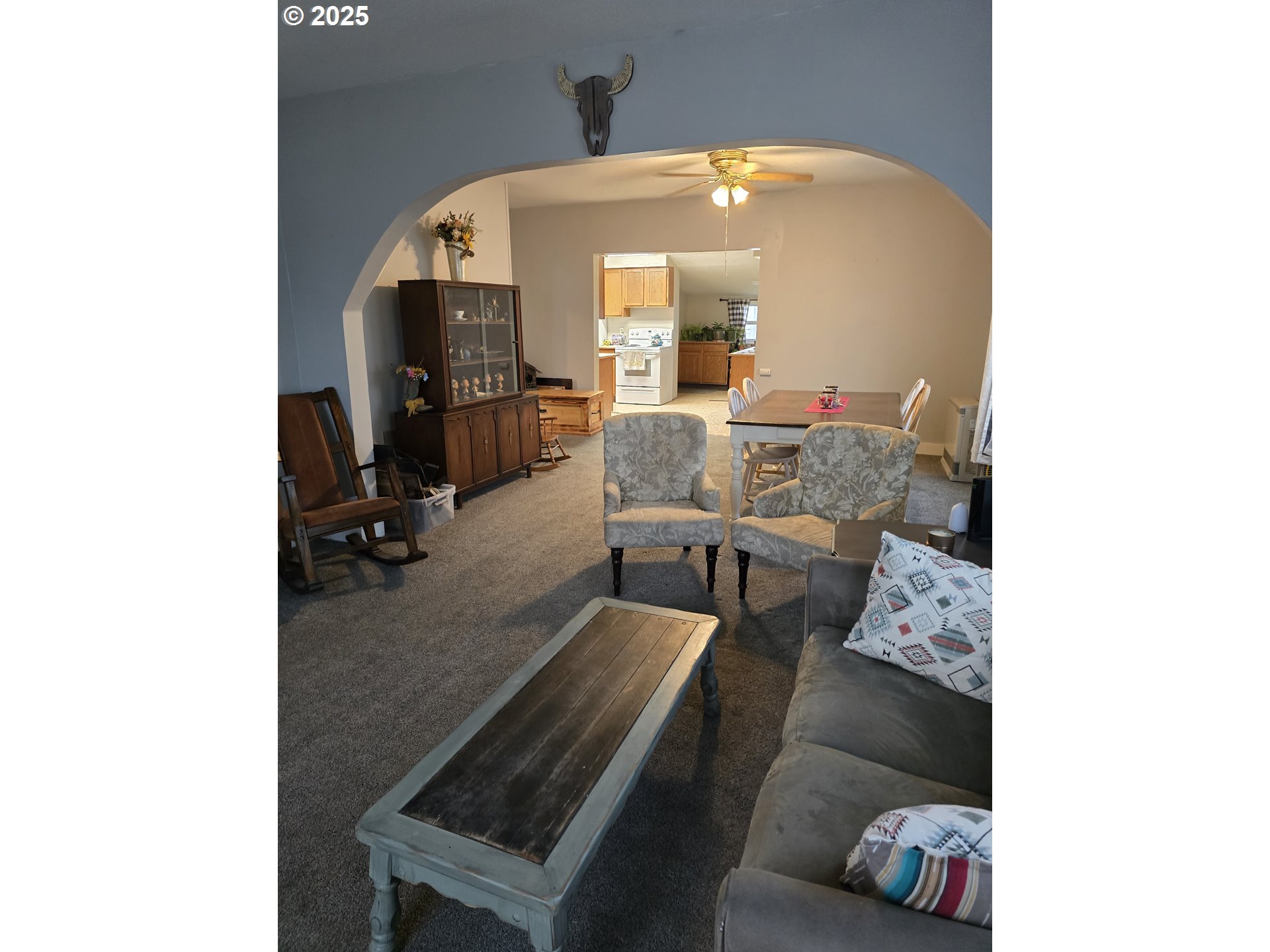 515 West Main Street Enterprise, OR 97828 - Photo 6 of 22 a living room with furniture and a mirror