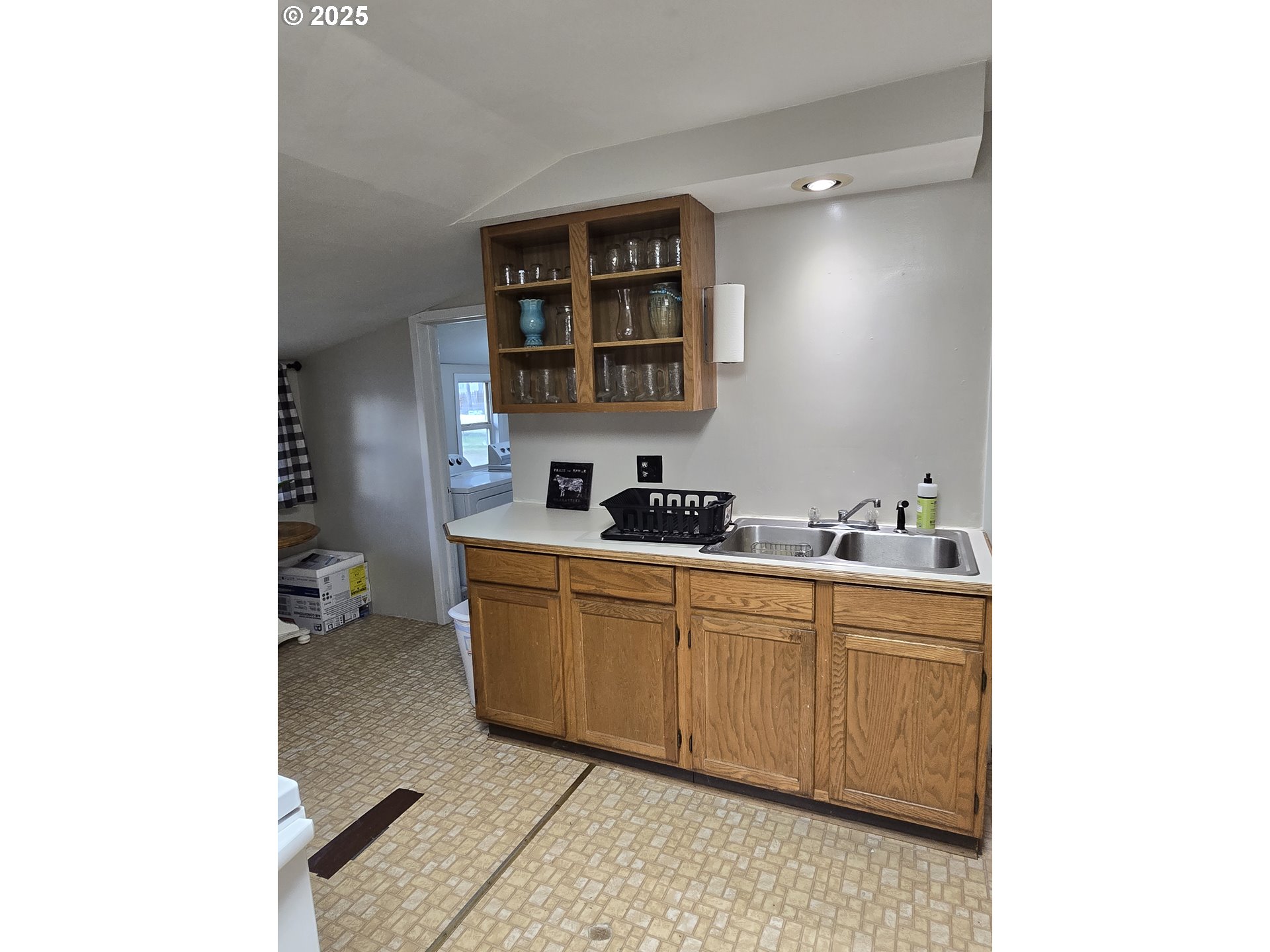 515 West Main Street Enterprise, OR 97828 - Photo 7 of 22 a spacious bathroom with a double vanity sink and a mirror