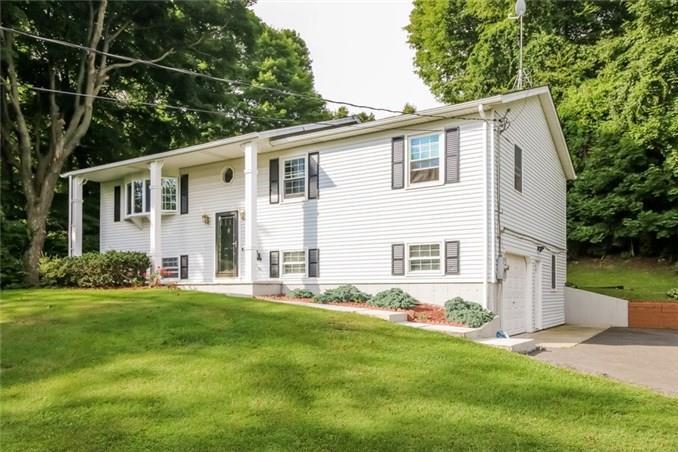 36 East Gate Road Danbury, CT 06811 - Photo 1 of 1 a front view of house with yard and green space