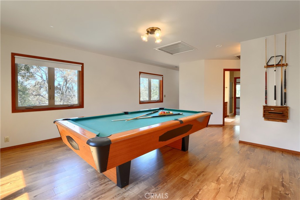 5857 Allred Road Mariposa, CA 95338 - Photo 15 of 62 a room with pool table and wooden floor