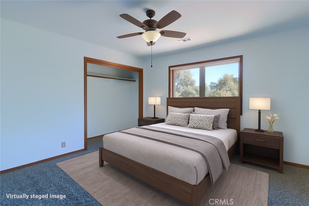 5857 Allred Road Mariposa, CA 95338 - Photo 28 of 62 a bedroom with bed and window