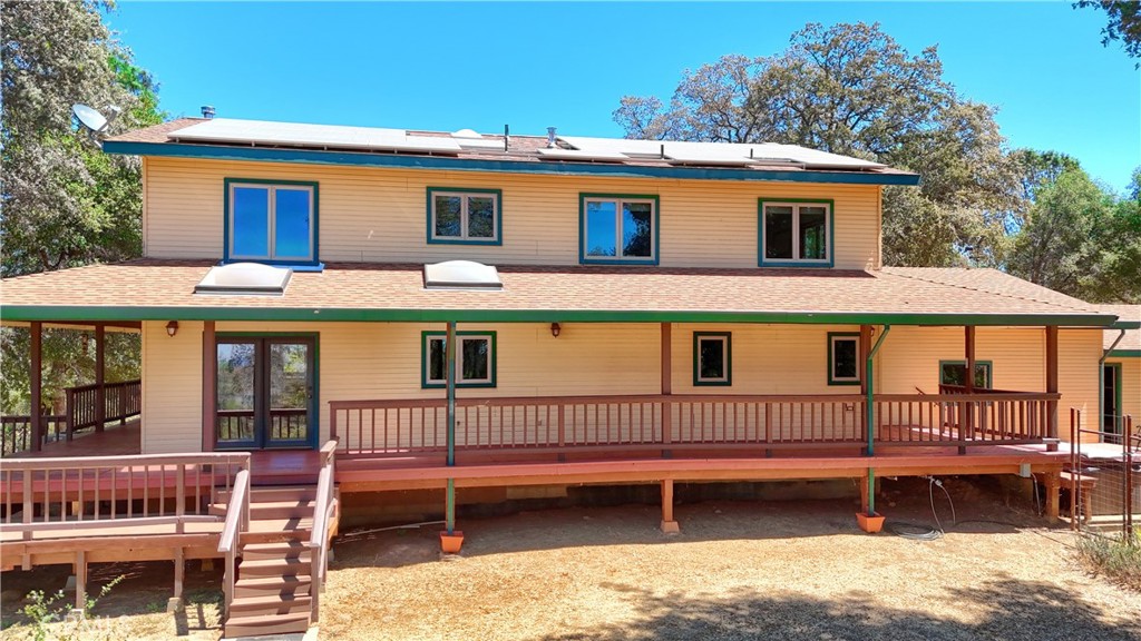 5857 Allred Road Mariposa, CA 95338 - Photo 43 of 62 a view of a house with a wooden deck
