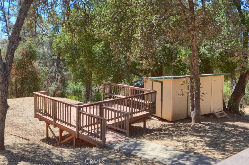 5857 Allred Road Mariposa, CA 95338 - Photo 50 of 62 a view of a roof deck with wooden fence and floor