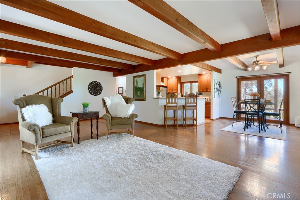 5857 Allred Road Mariposa, CA 95338 - Photo 61 of 62 a large living room with furniture and wooden floor