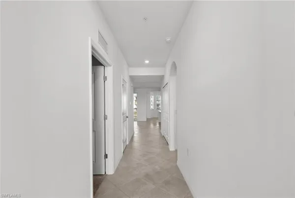 a kitchen with a sink cabinets and stainless steel appliances