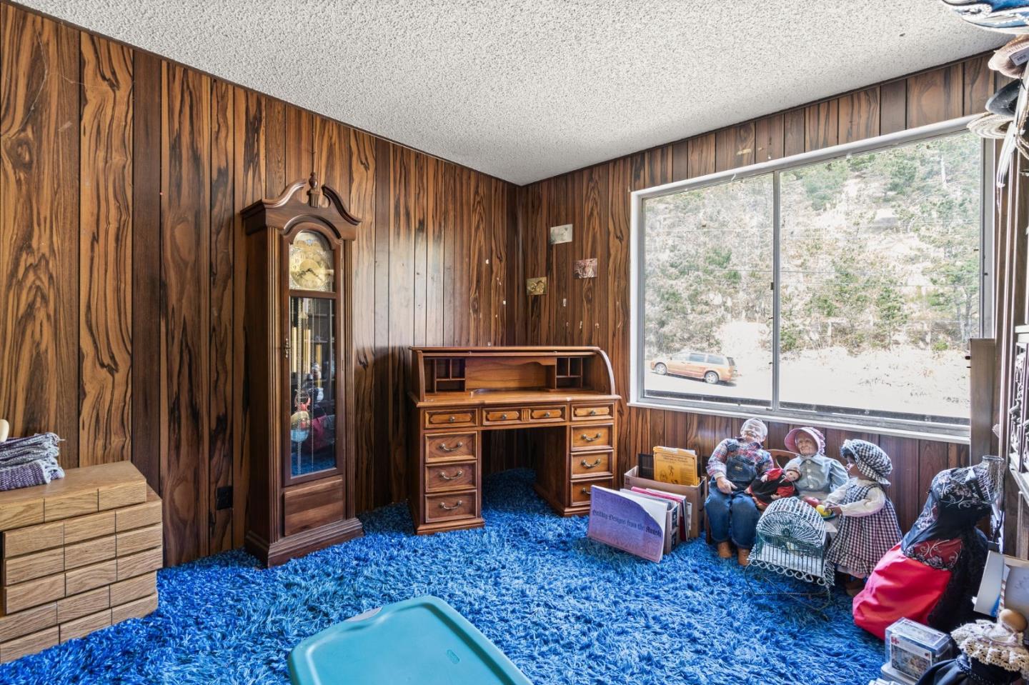 107 Hickey Boulevard Pacifica, CA 94044 - Photo 17 of 29 a living room with furniture and a floor to ceiling window