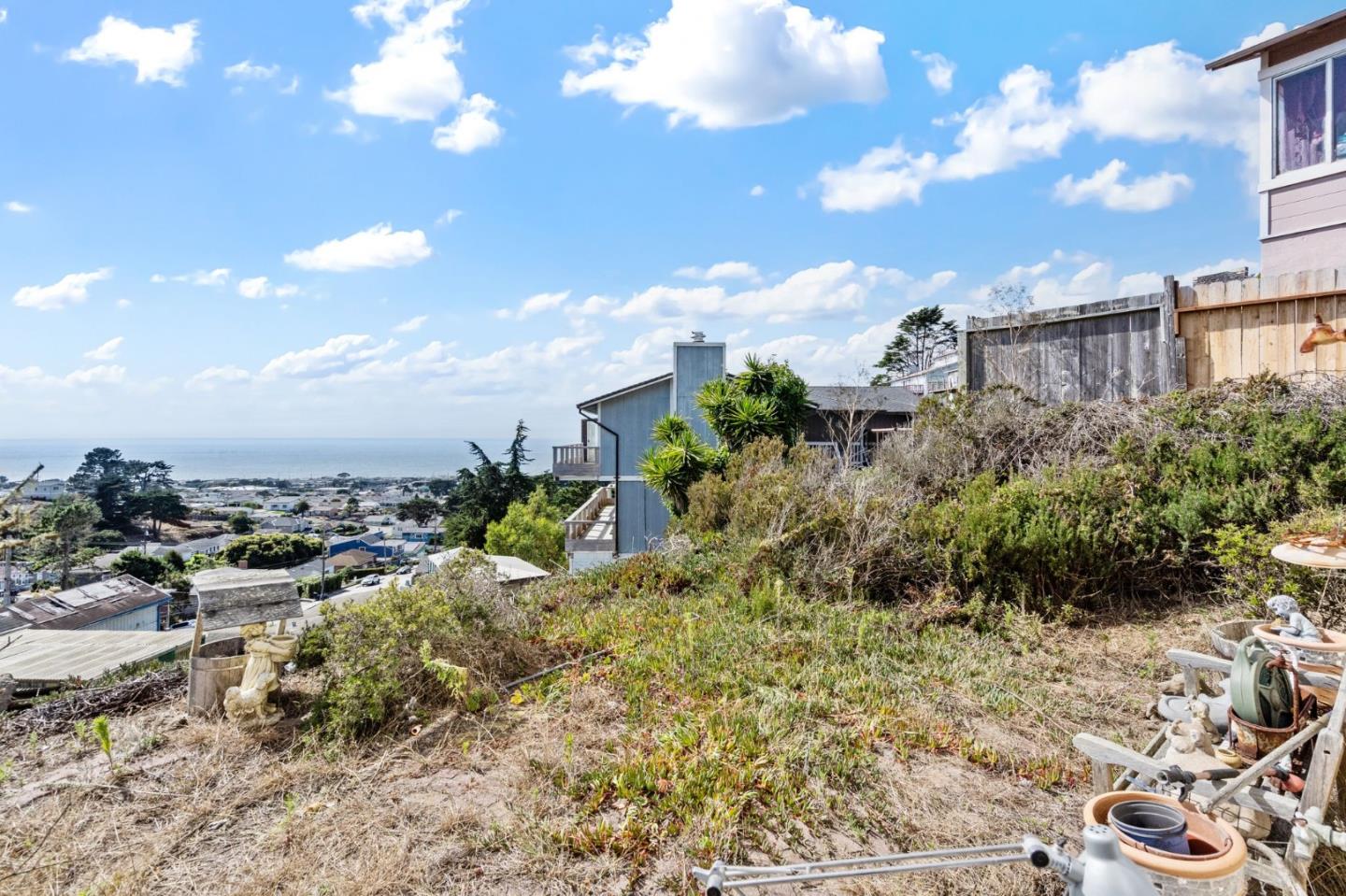 107 Hickey Boulevard Pacifica, CA 94044 - Photo 25 of 29 a view of a houses with a yard