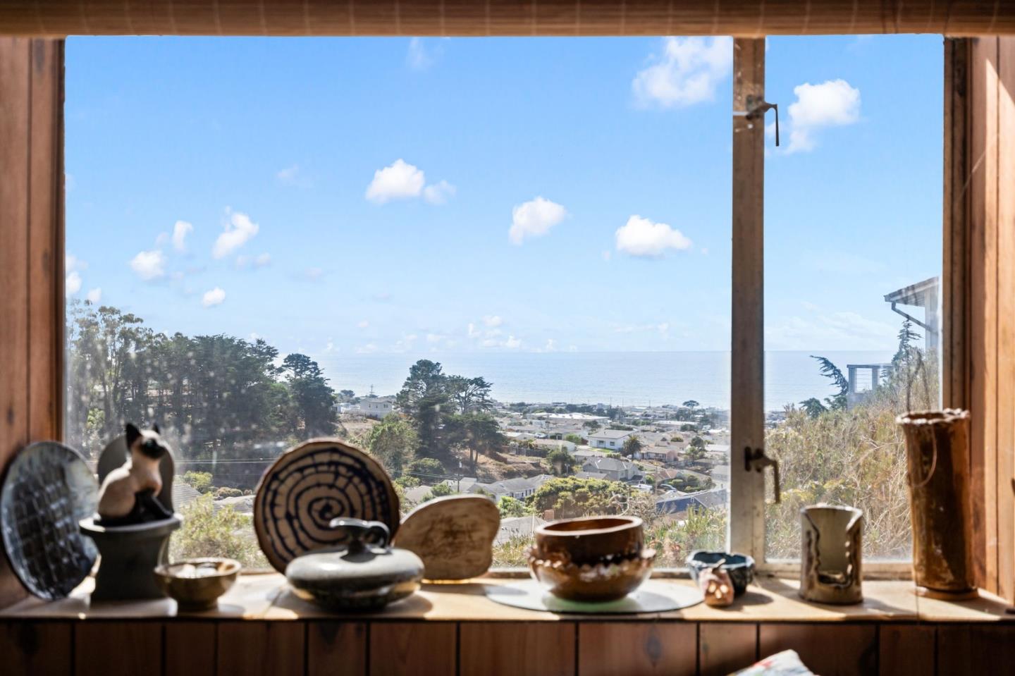 107 Hickey Boulevard Pacifica, CA 94044 - Photo 27 of 29 a picture of a city from a balcony