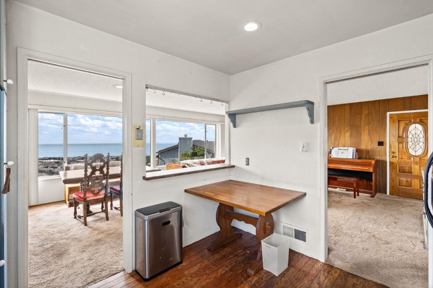 107 Hickey Boulevard Pacifica, CA 94044 - Photo 10 of 29 a room with furniture and a table