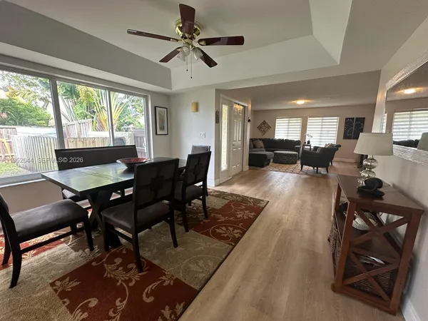 a view of a dining room with furniture
