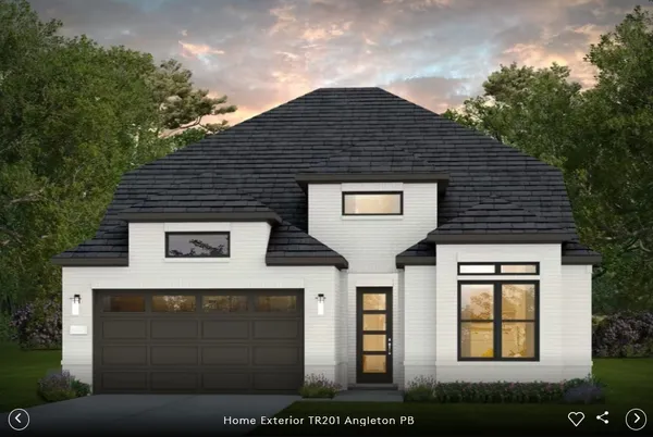 a front view of a house with garage