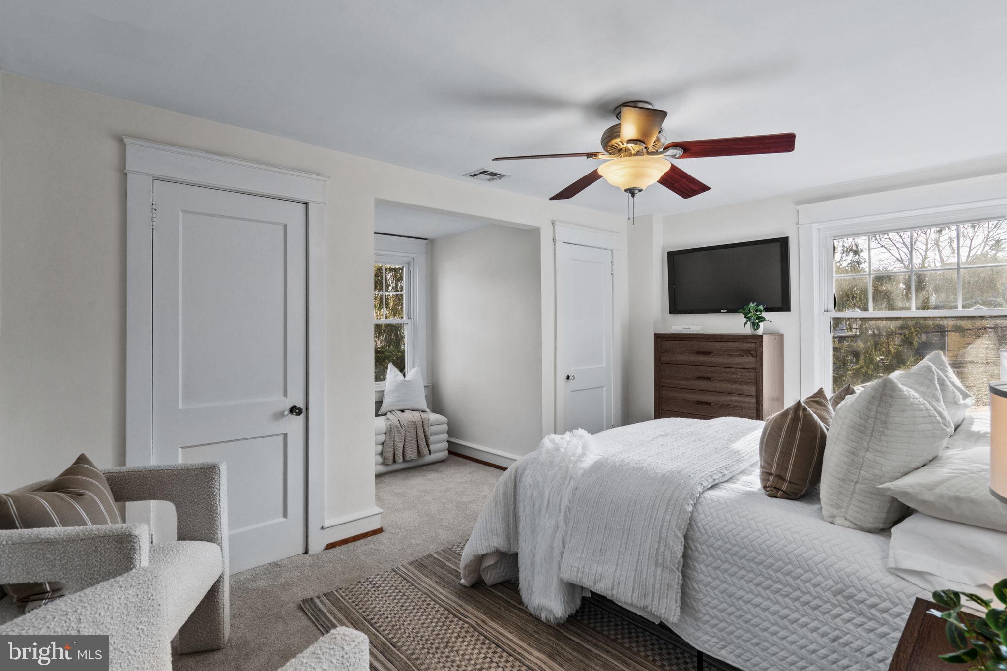 530 East Manoa Road Havertown, PA 19083 - Photo 19 of 32 a bedroom with a bed and a couch