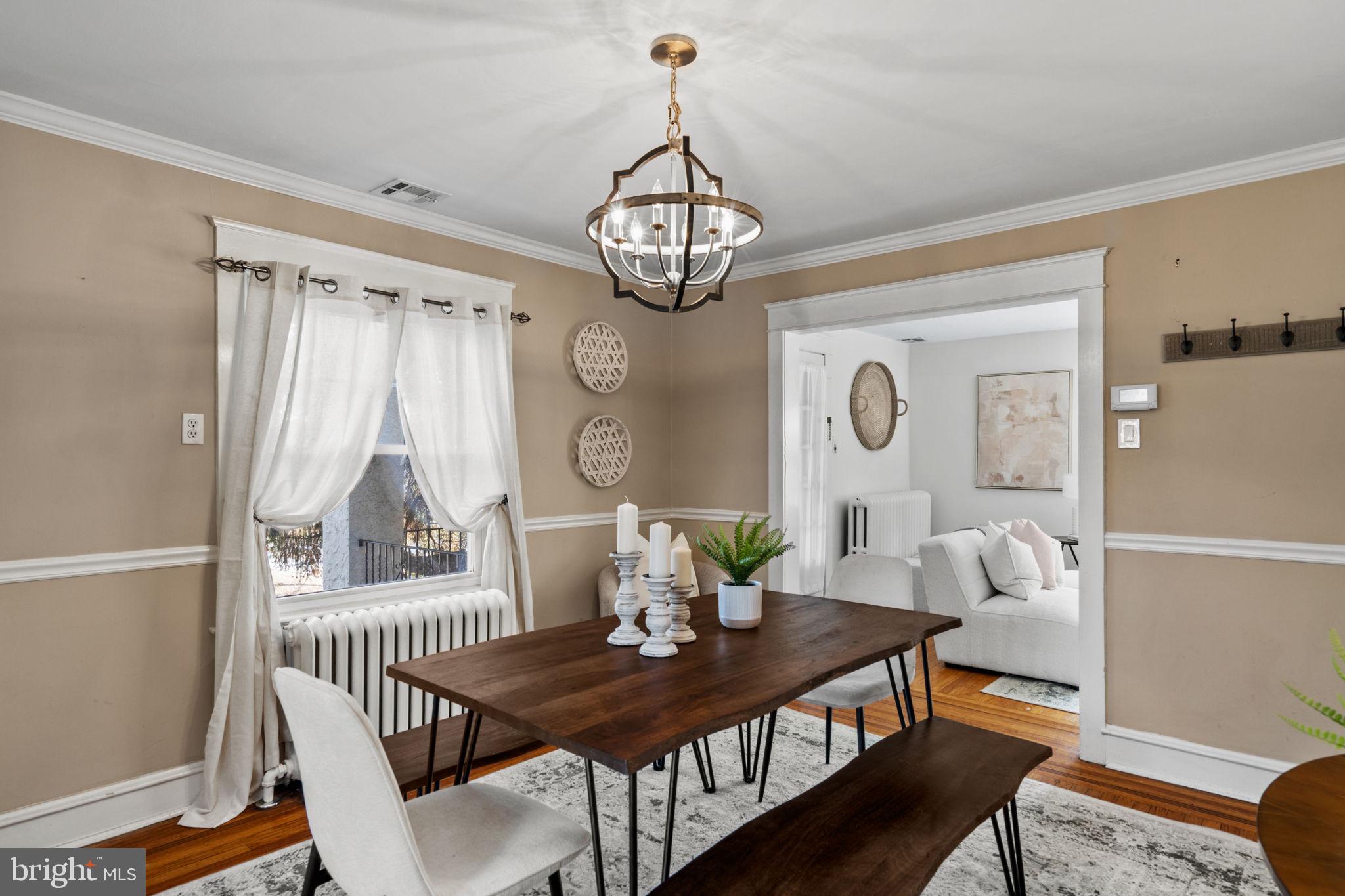 530 East Manoa Road Havertown, PA 19083 - Photo 10 of 32 a view of a dining room with furniture window and wooden floor
