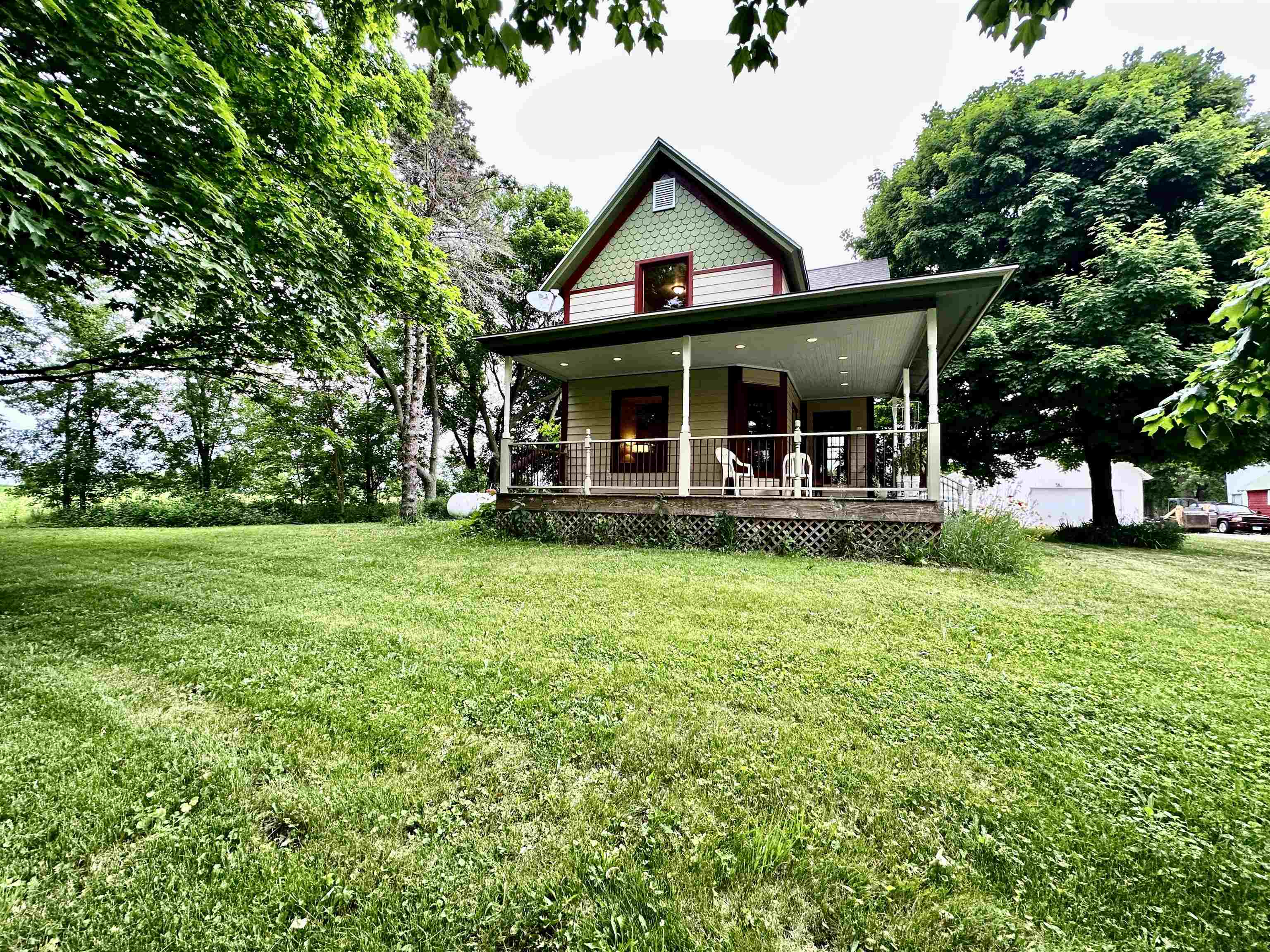 4415 Genoa Road Belvidere, IL 61008 - Photo 1 of 51 front view of a house with a yard