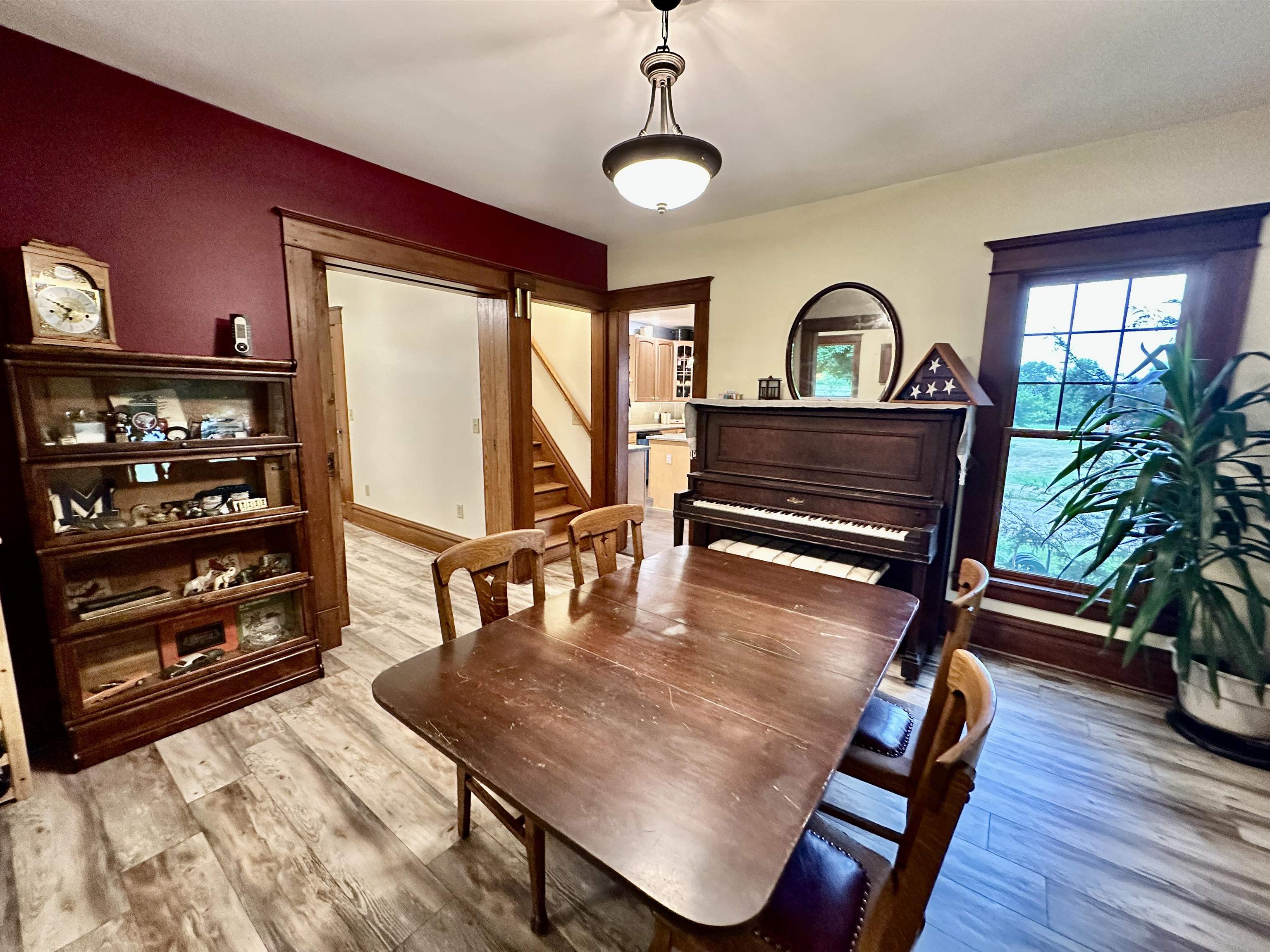 4415 Genoa Road Belvidere, IL 61008 - Photo 12 of 51 a view of a dining room with furniture window and wooden floor