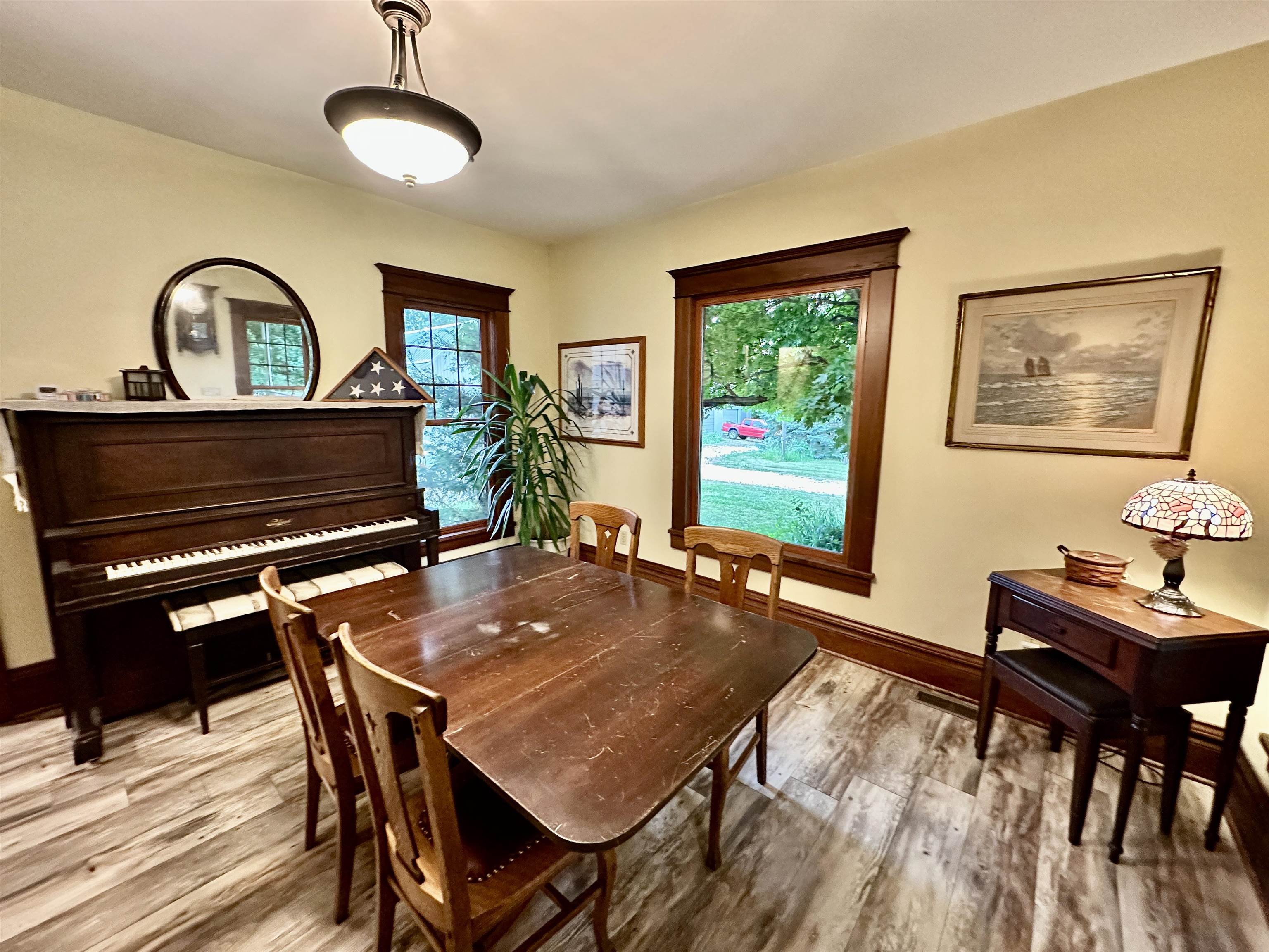 4415 Genoa Road Belvidere, IL 61008 - Photo 13 of 51 a view of a dining room with furniture window and wooden floor