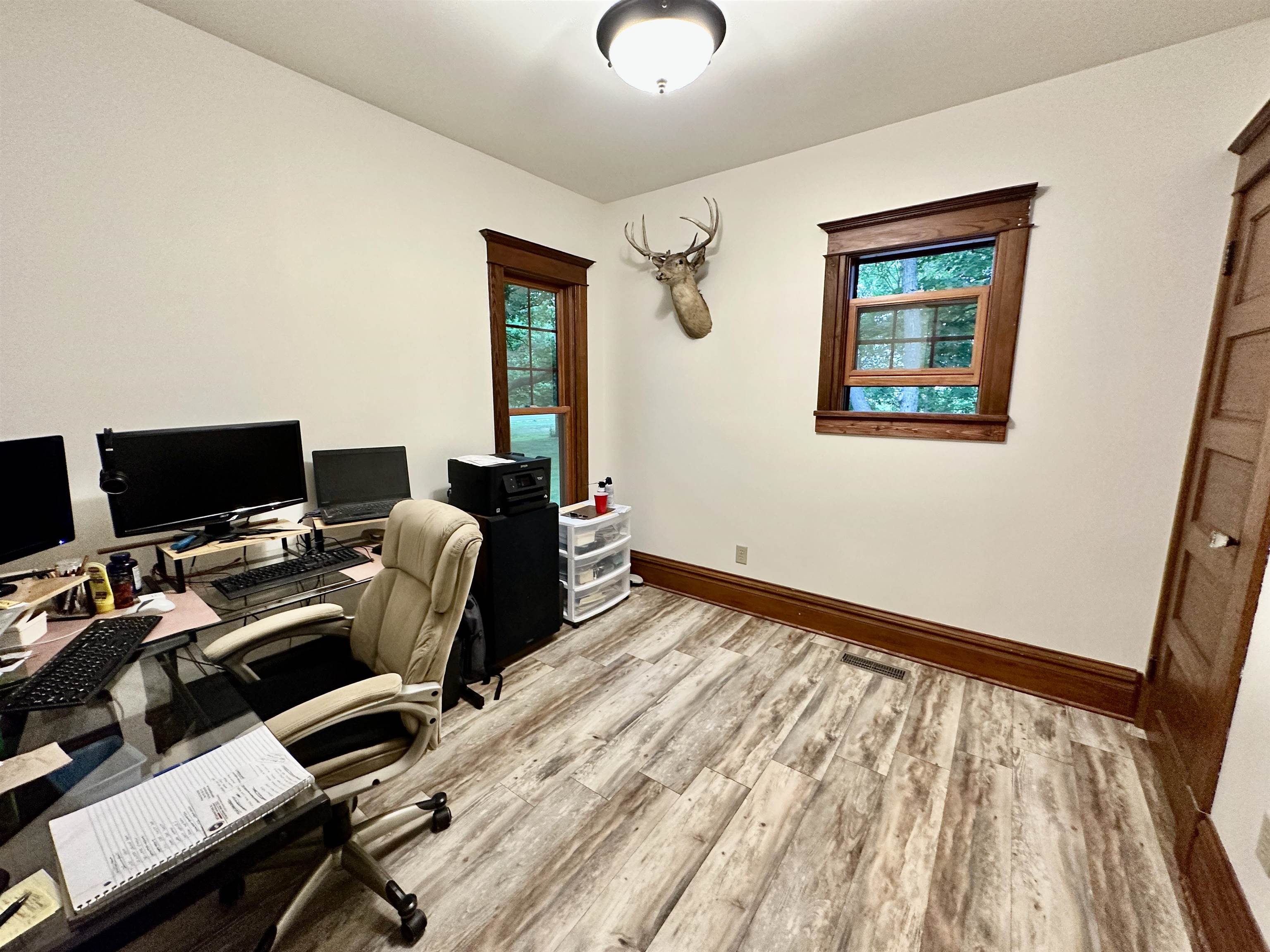 4415 Genoa Road Belvidere, IL 61008 - Photo 14 of 51 a view of a workspace with furniture and a window
