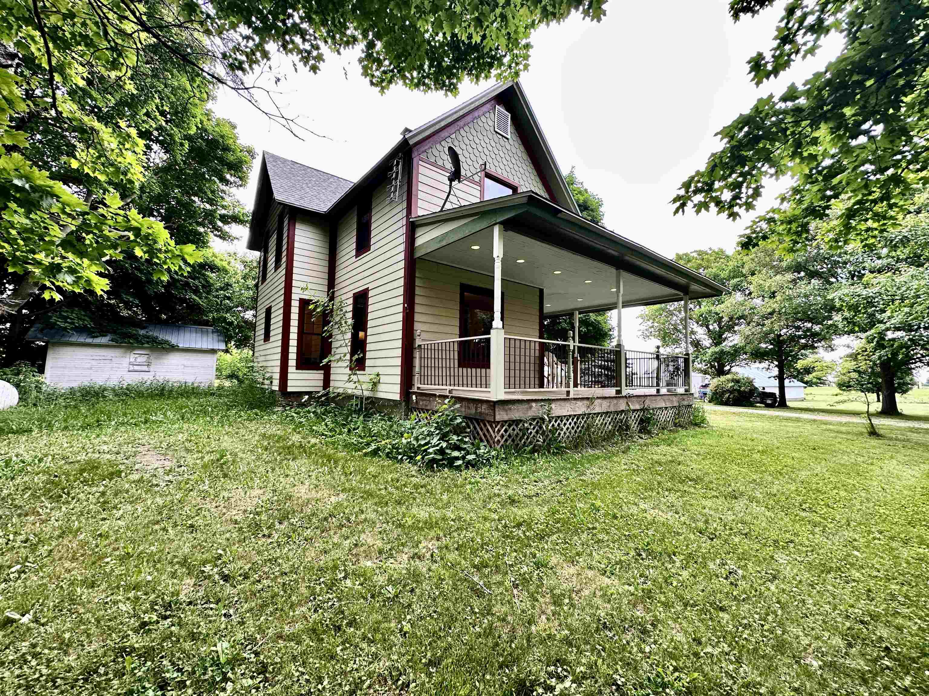4415 Genoa Road Belvidere, IL 61008 - Photo 2 of 51 a view of a house with a yard and sitting area