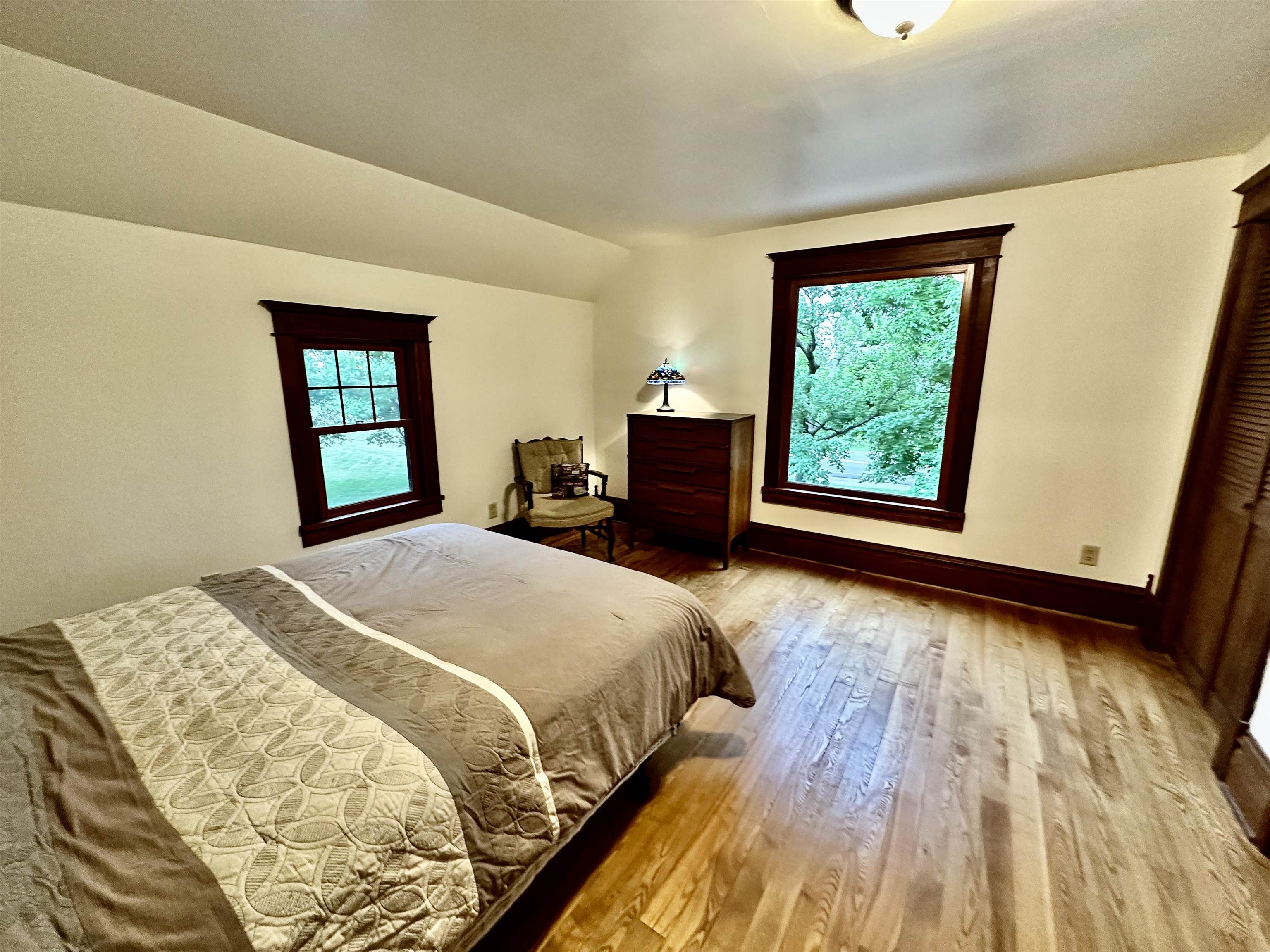 4415 Genoa Road Belvidere, IL 61008 - Photo 30 of 51 a bedroom with a bed and a large window