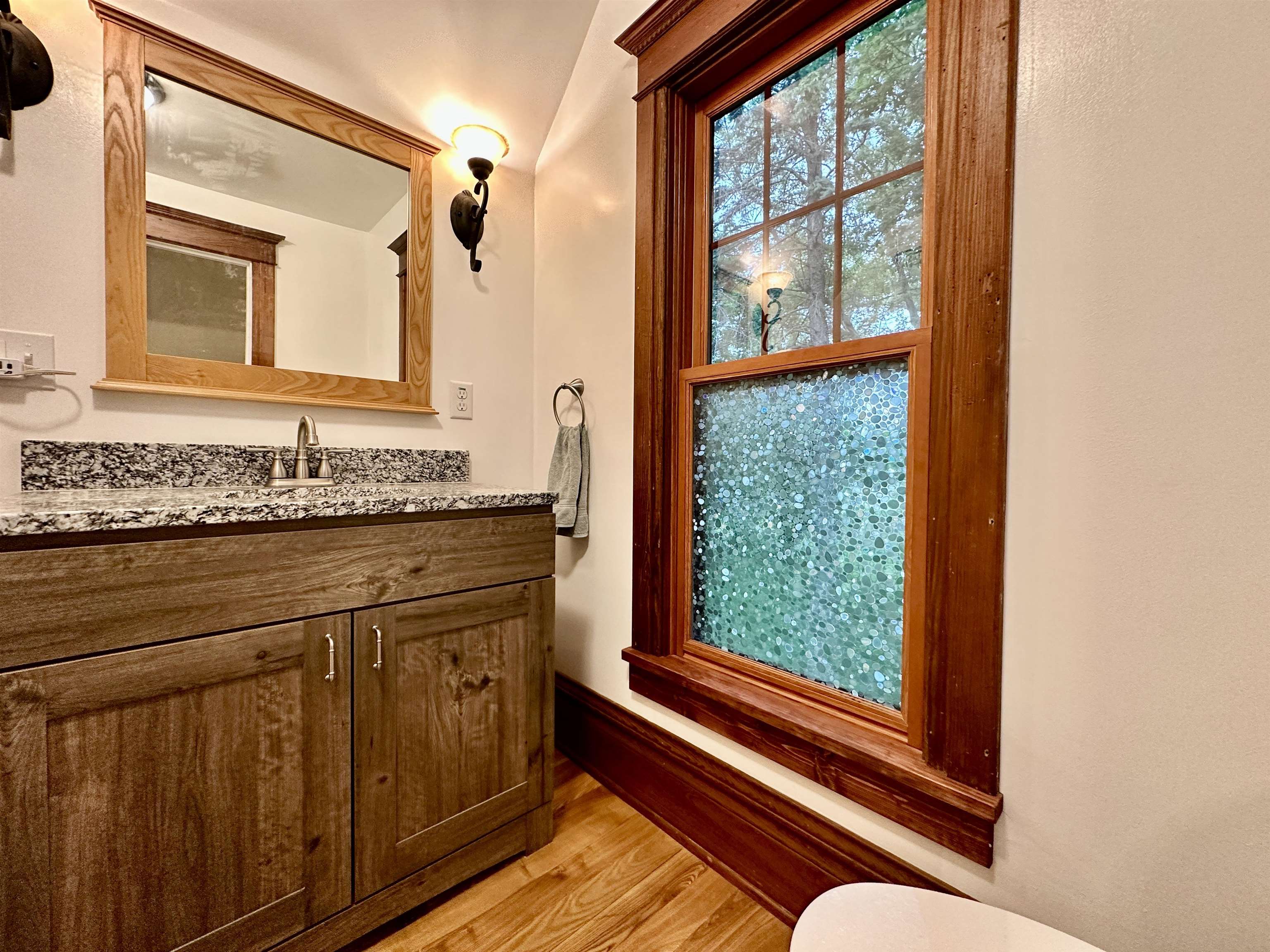 4415 Genoa Road Belvidere, IL 61008 - Photo 35 of 51 a view of a bathroom with a sink and a mirror