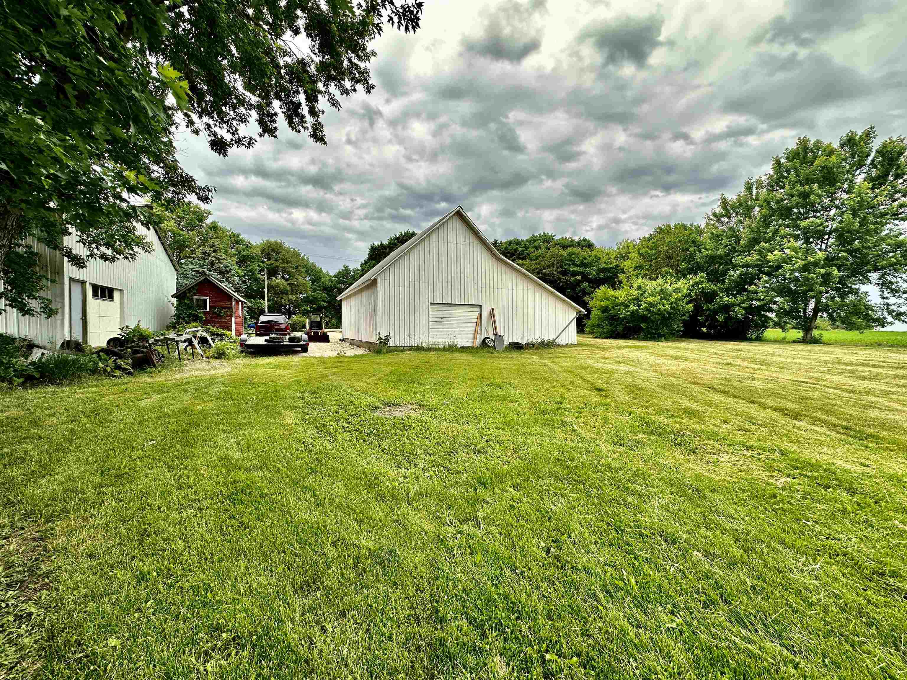 4415 Genoa Road Belvidere, IL 61008 - Photo 38 of 51 a view of a house with a yard