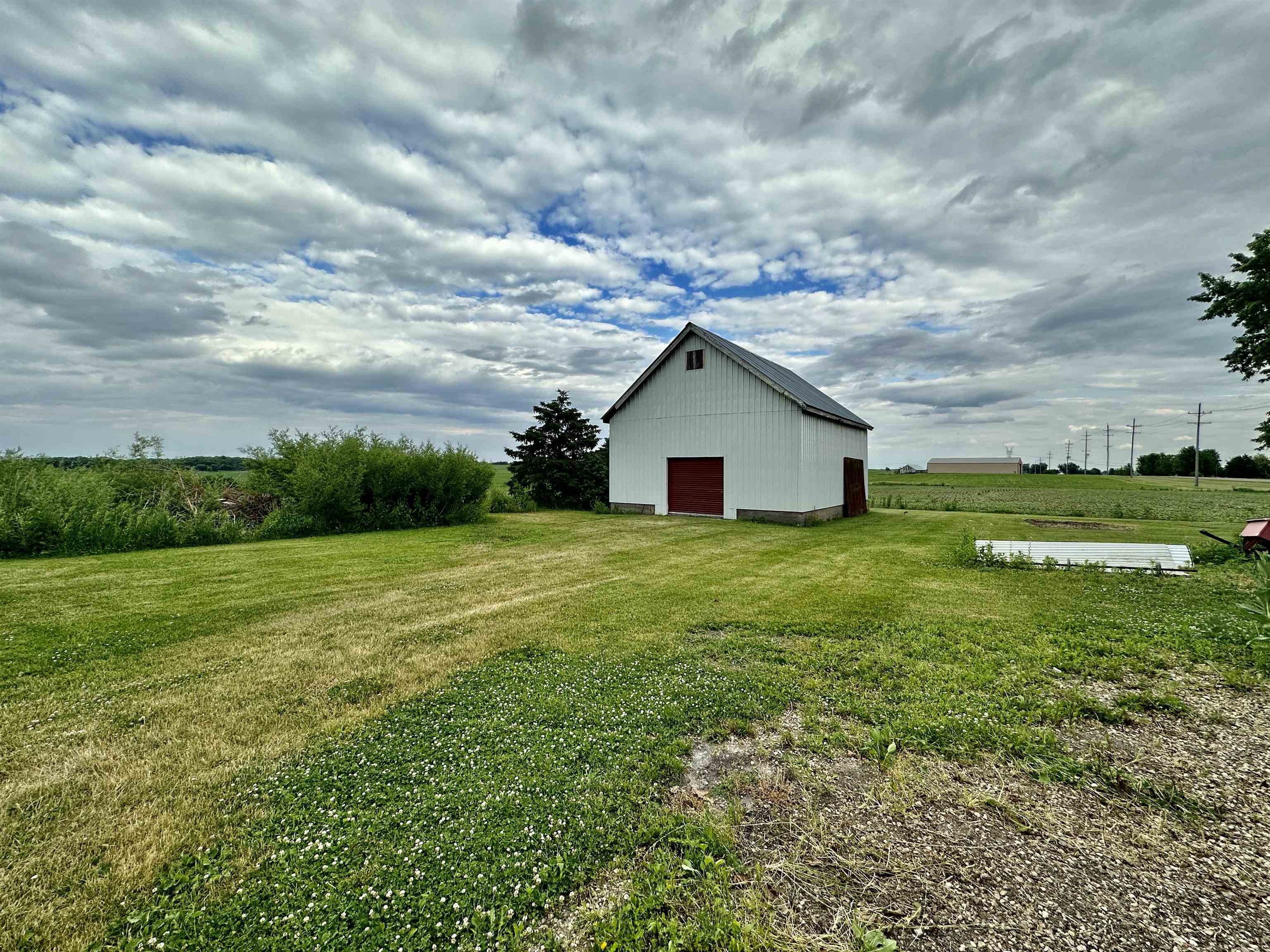 4415 Genoa Road Belvidere, IL 61008 - Photo 40 of 51 a view of a house with a yard