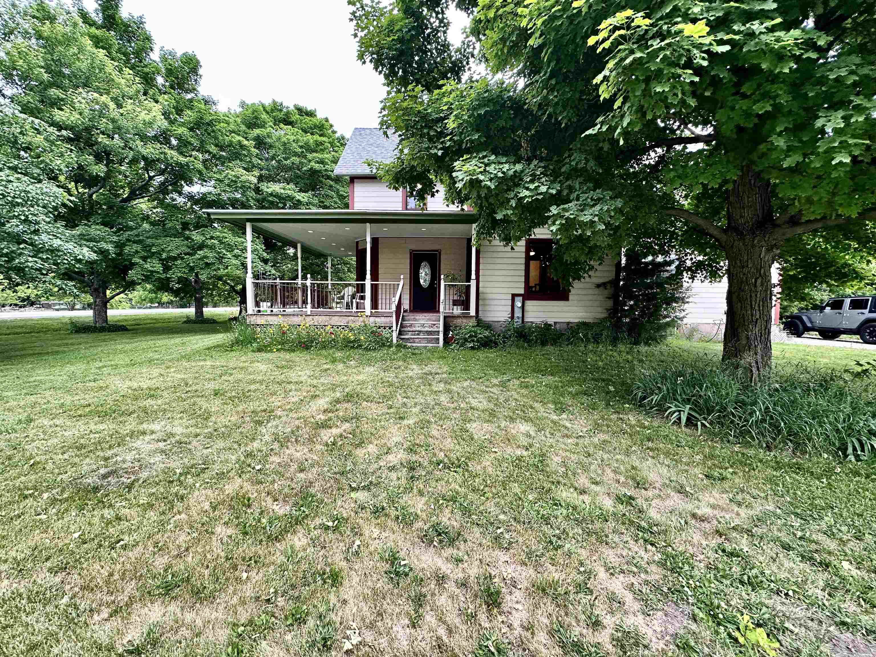 4415 Genoa Road Belvidere, IL 61008 - Photo 4 of 51 a view of a house with a yard