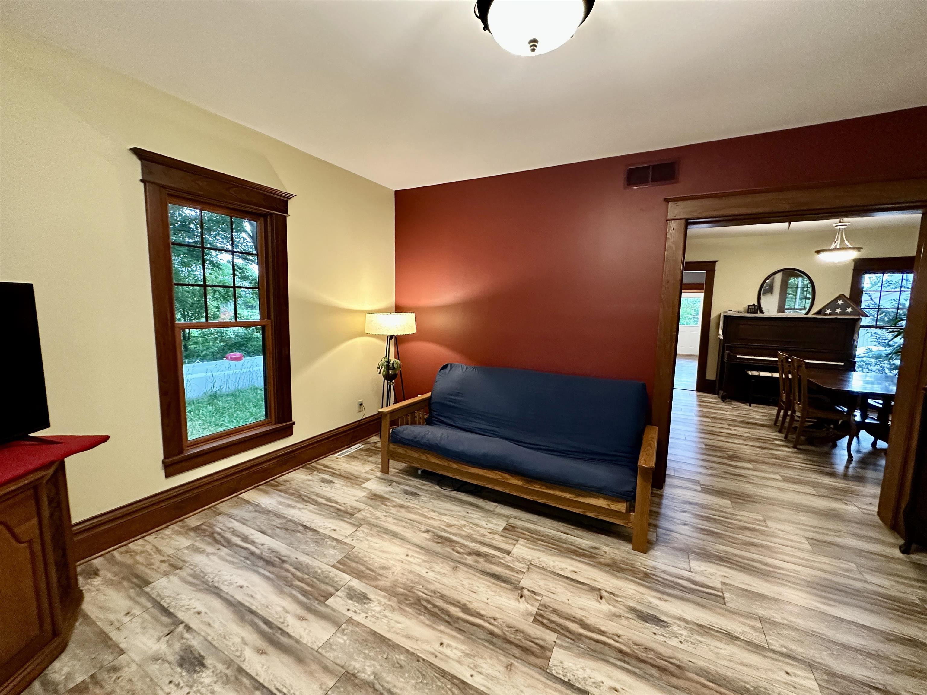 4415 Genoa Road Belvidere, IL 61008 - Photo 8 of 51 a sitting area with wooden floor