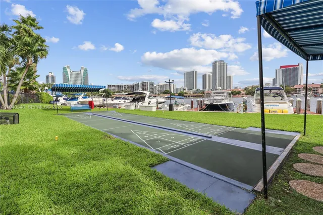 a view of an chairs in front of house