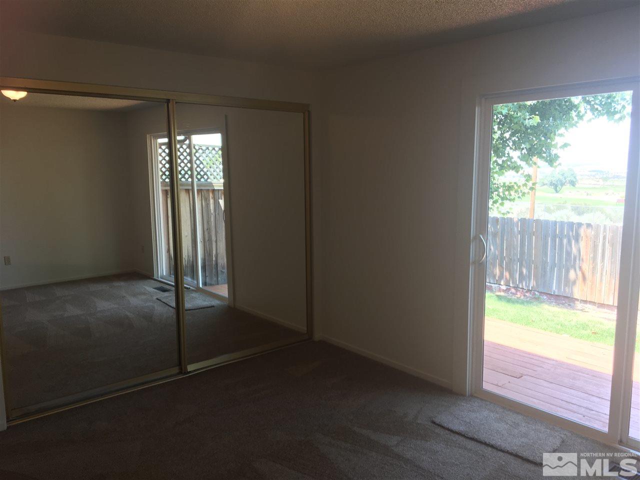6655 Lotus Street Reno, NV 89506 - Photo 11 of 18 a view of an empty room and window