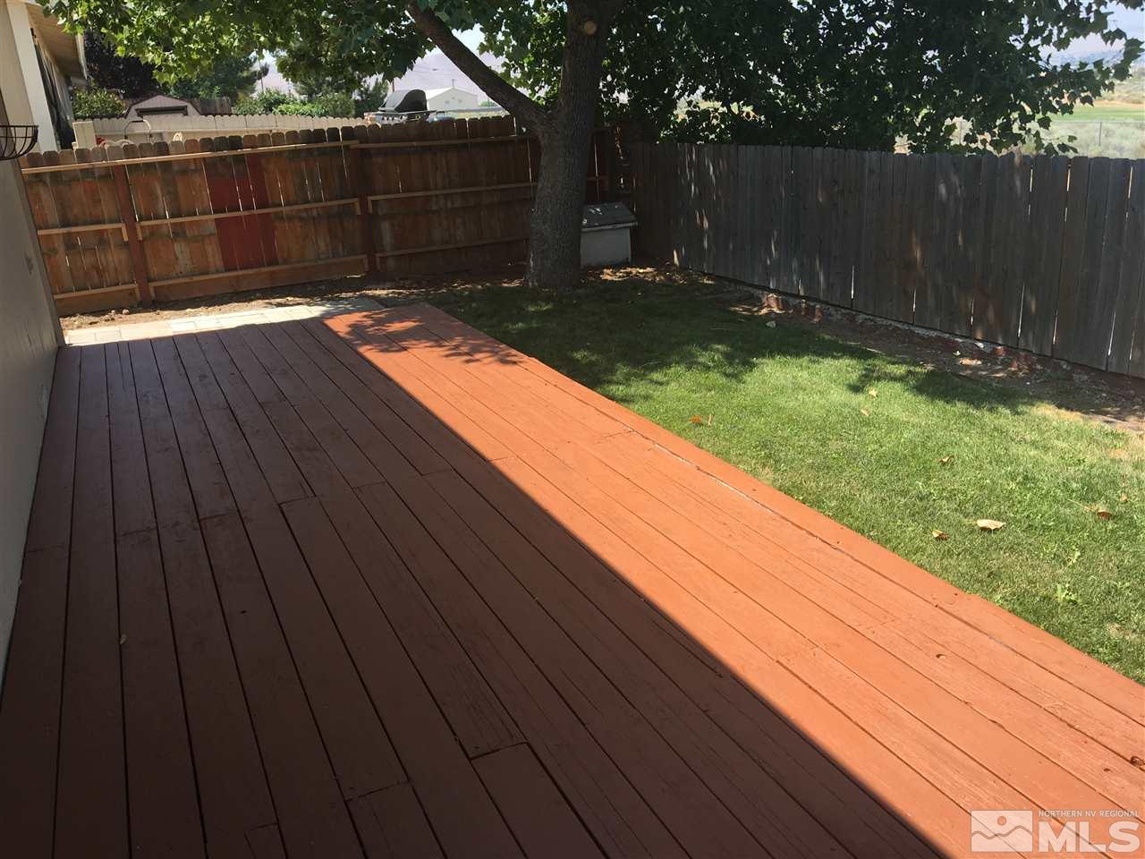 6655 Lotus Street Reno, NV 89506 - Photo 14 of 18 a view of outdoor space with wooden floor