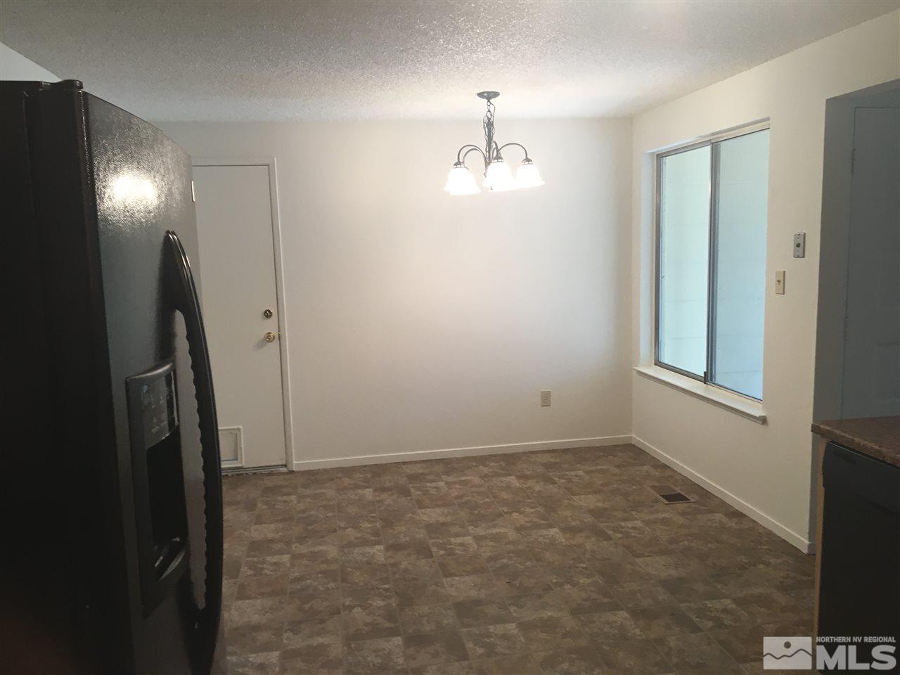 6655 Lotus Street Reno, NV 89506 - Photo 6 of 18 a view of empty room