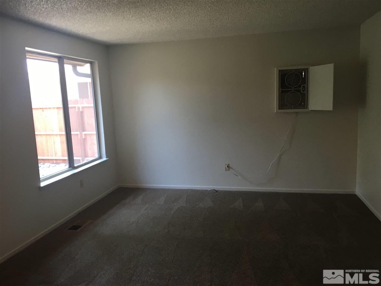6655 Lotus Street Reno, NV 89506 - Photo 7 of 18 a view of room and window