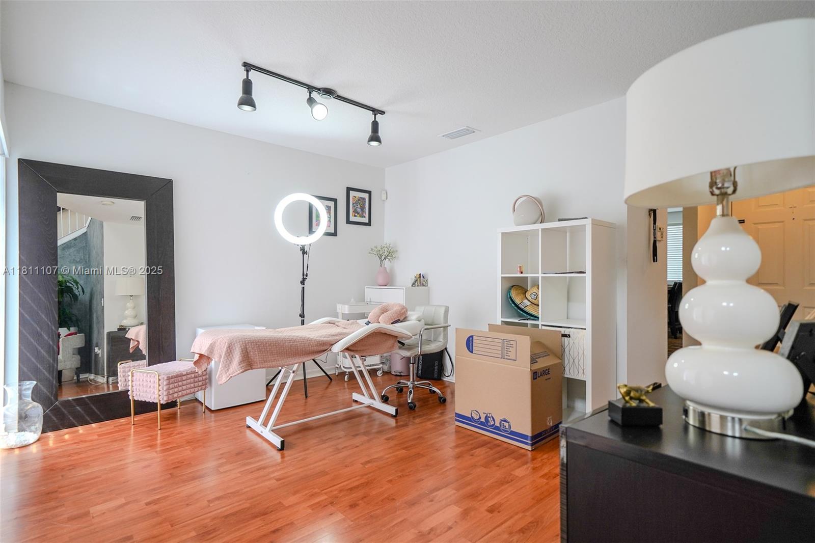 14816 Southwest 104th Street, Unit 85 Miami, FL 33196 - Photo 18 of 20 a living room with furniture and a large window