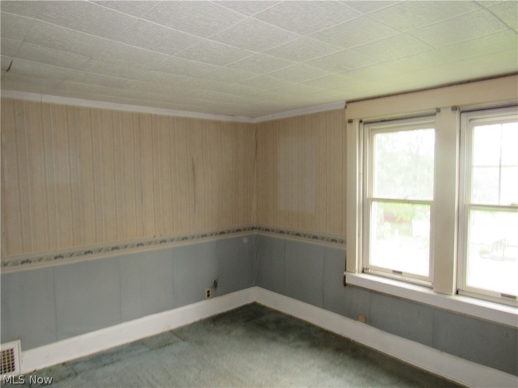 3462 Niles Carver Road Mineral Ridge, OH 44440 - Photo 19 of 33 Carpeted empty room with plenty of natural light