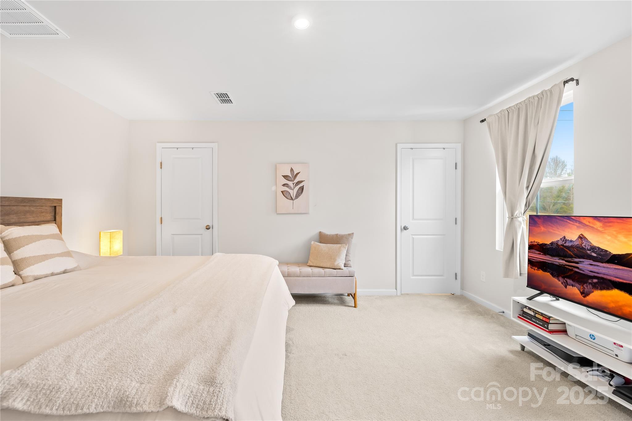 4447 Wild Rdg Drive Charlotte, NC 28215 - Photo 12 of 30 a bedroom with a bed and furniture