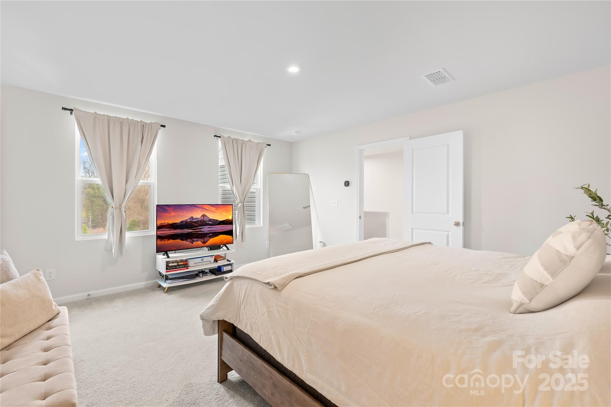 4447 Wild Rdg Drive Charlotte, NC 28215 - Photo 13 of 30 a bedroom with furniture and a window
