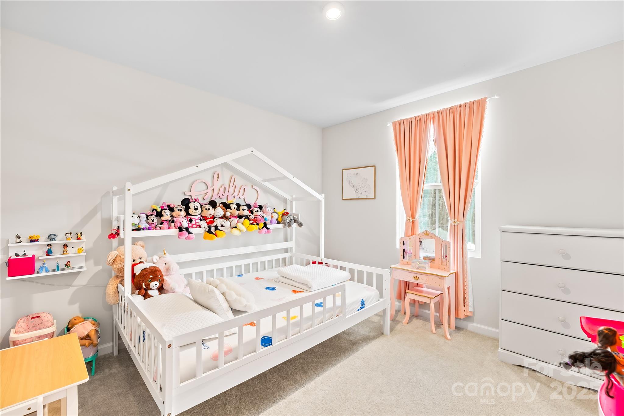 4447 Wild Rdg Drive Charlotte, NC 28215 - Photo 18 of 30 a bedroom with a bed and a window