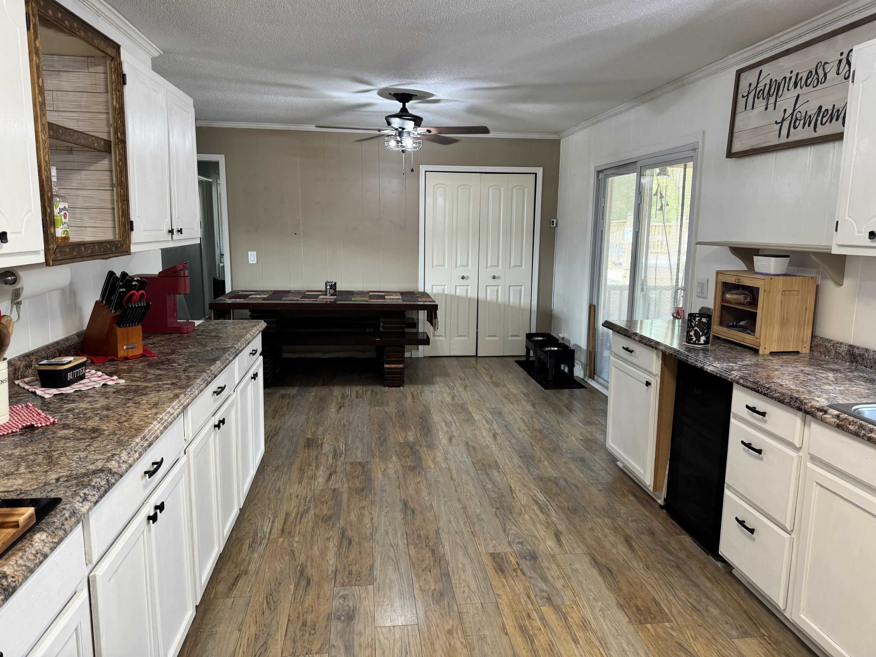 1133 Oak Avenue Elba, AL 36323 - Photo 7 of 26 a large kitchen with a stove top oven