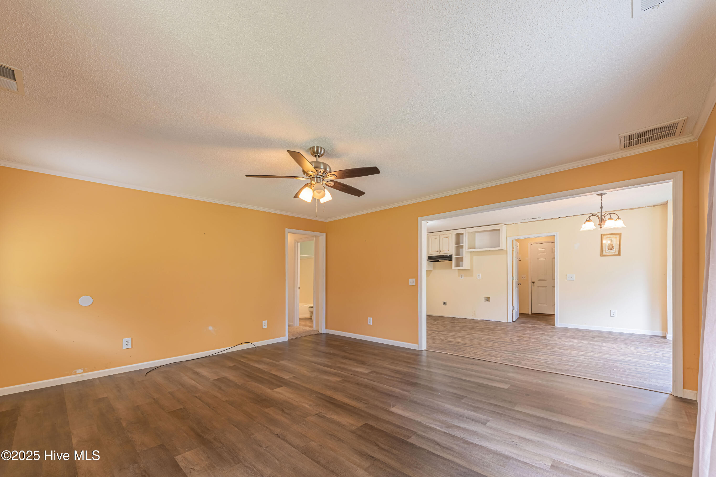 127 Rodney Lanier Road Chinquapin, NC 28521 - Photo 13 of 60 Living room and dining area