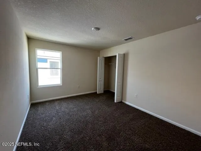 a view of empty room with window