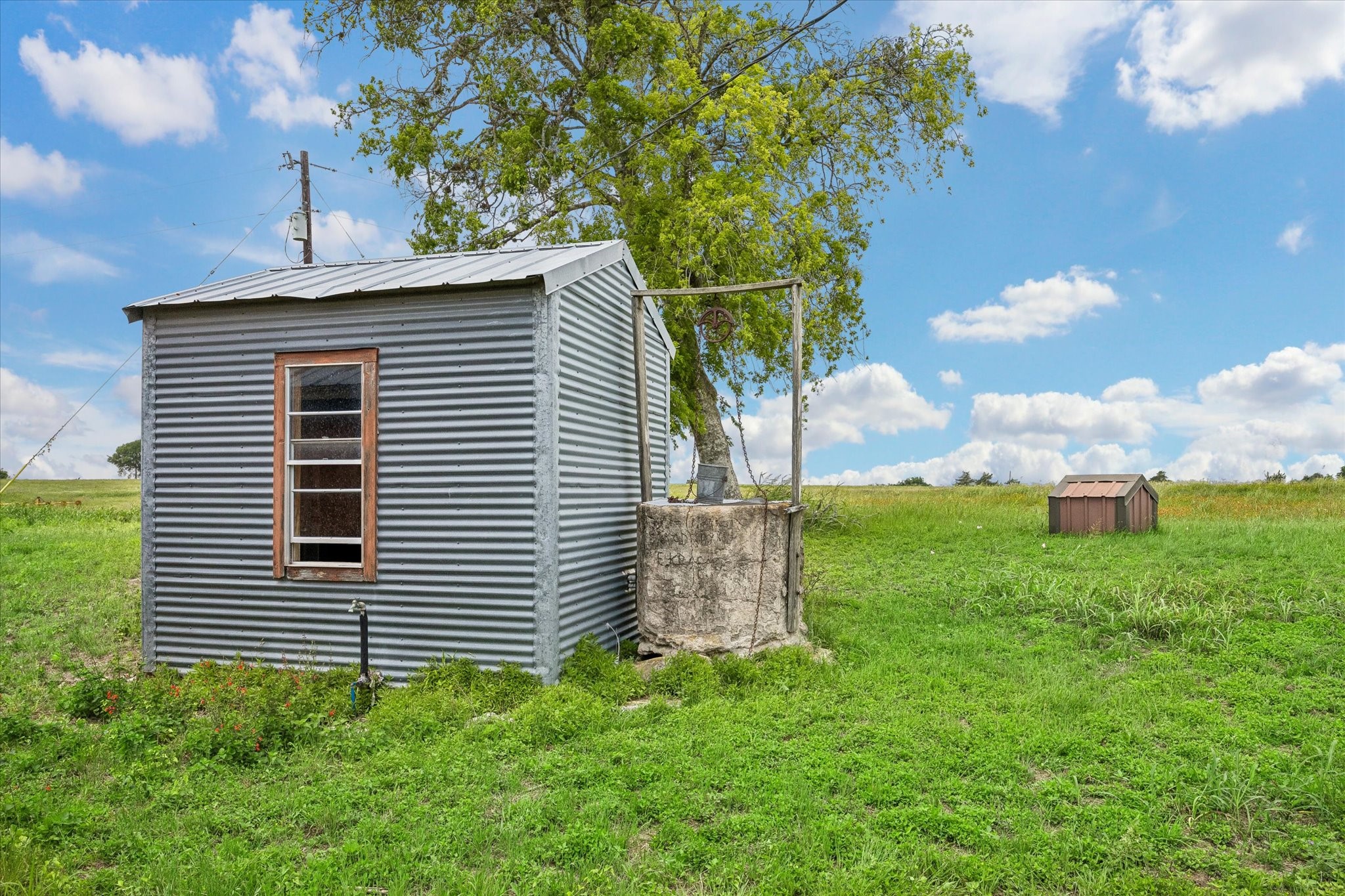 4754 Wickel Road Burton, TX 77835 - Photo 14 of 23 a view of a house with a yard